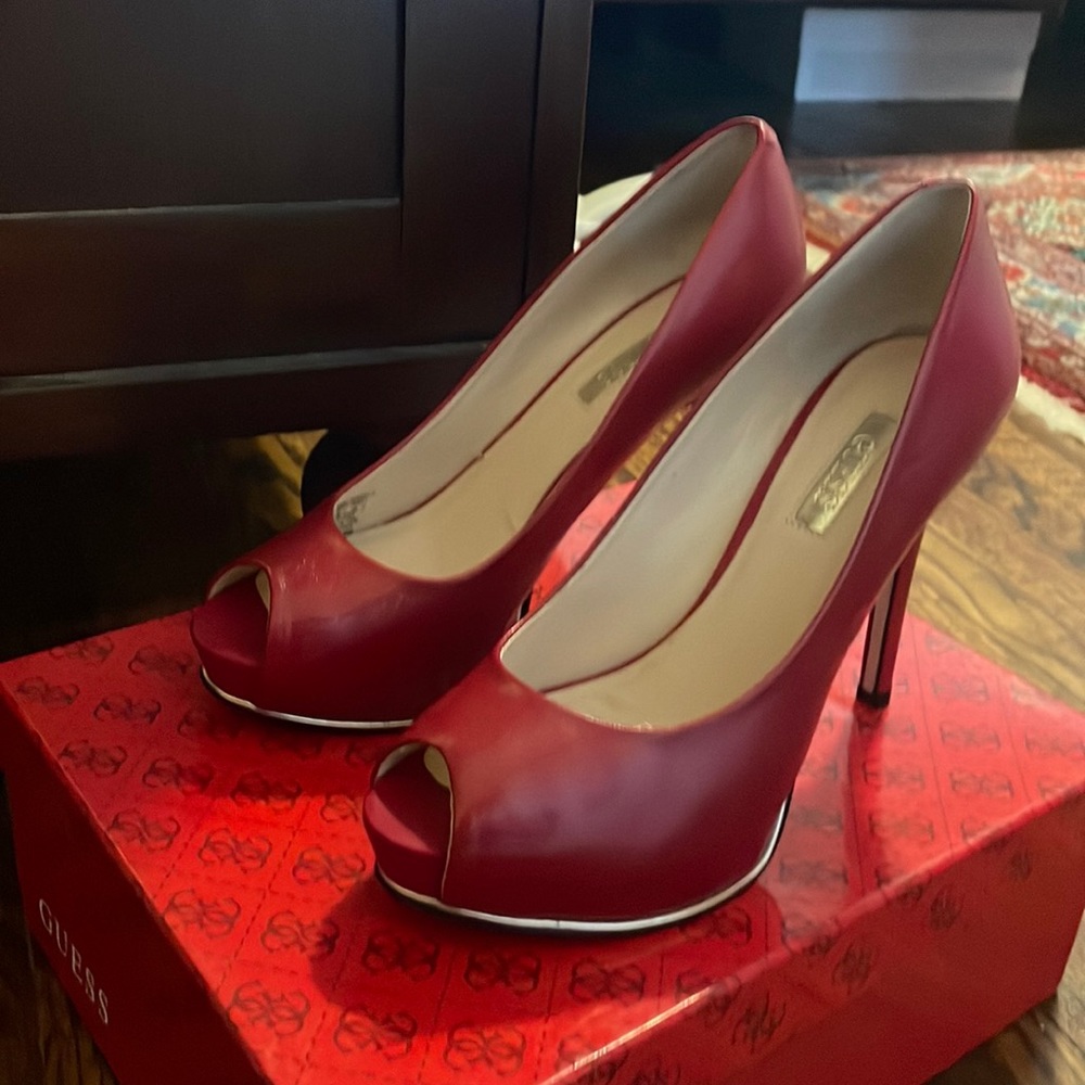 guess red high heels bought and NEVER wore! super cute! has wedge inside